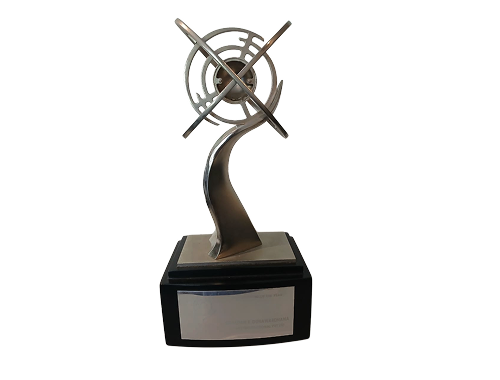 Modern abstract metal award trophy with circular design on a black base