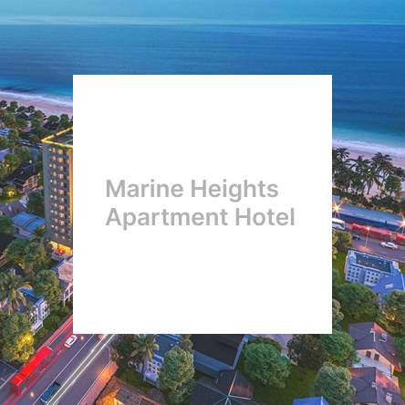 Marine Heights Apartment Hotel name over an aerial seaside city view with ocean and coastal road
